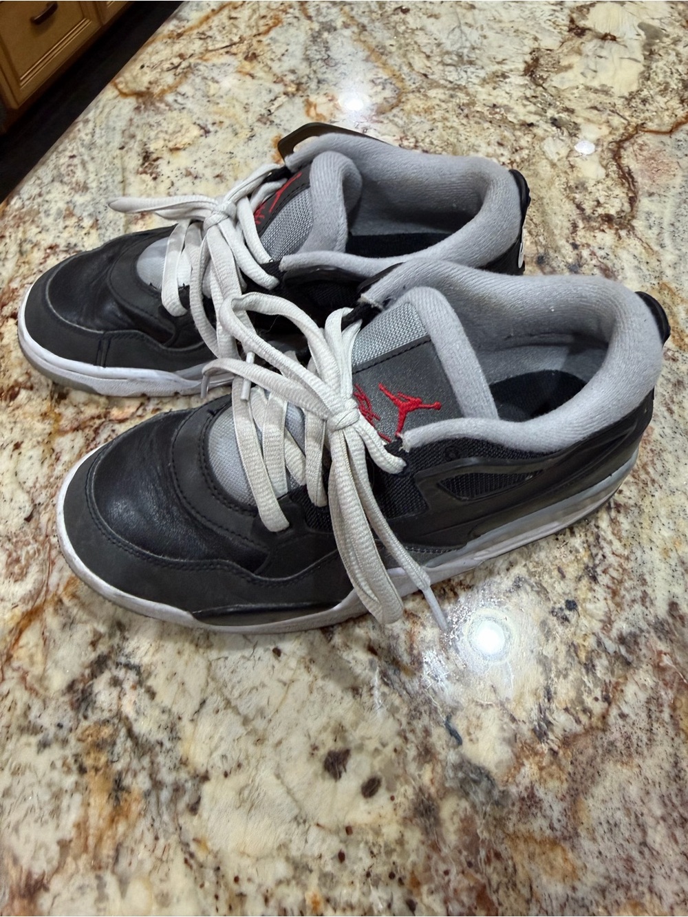 Nike Kids Jordan 4 Black and Gray Sneakers with Red Logo